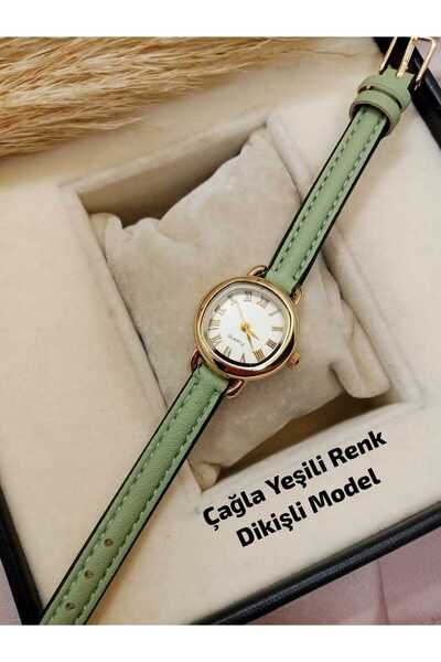 QUARTZ ساعة يد من ماركة ريترو بعلبة فولاذية بيضاوية الشكل بلون ذهبي وحزام بلو...