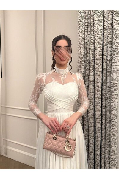 ainaqat aljawhara Evening dress