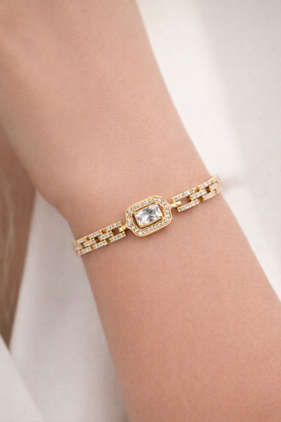 femline سوار نسائي من حجر الباجيت اللامع باللون الذهبي