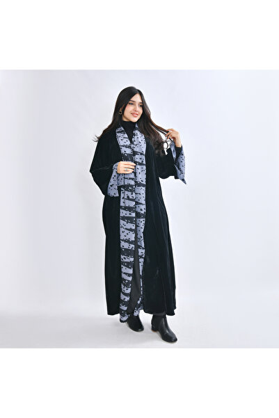 HAWRAA ABAYA An abaya made of soft black velvet with Printed gray chiffon add...