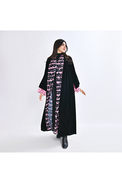 HAWRAA ABAYA An abaya made of soft black velvet with a pink Printed chiffon o...