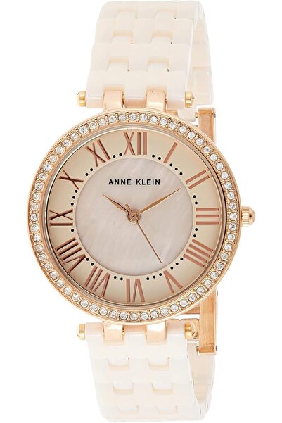 Anne Klein ساعة نسائية بحزام سيراميك ومينا بلون أبيض مائل للصفرة، AK2130RGLP،...