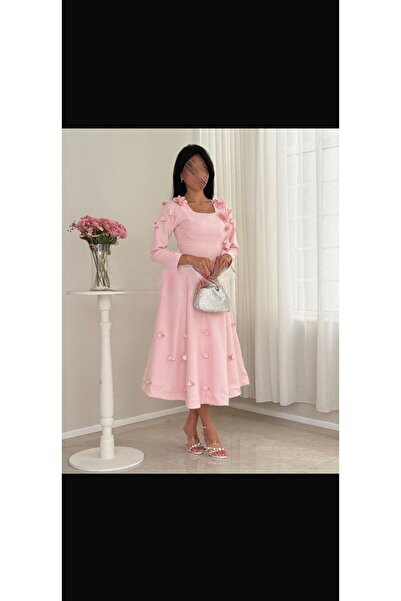 ProWorks & RTC A soft pink midi dress with a sophisticated, feminine cut.
