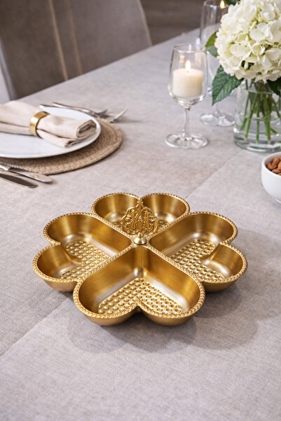 Generic A luxurious, multi-compartment gold serving platter – a touch of eleg...