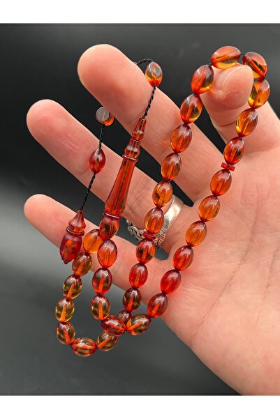 Cemhan Göksal سبحة من حجر العنبر الناري مقاس 8×11 ملم، مصنوعة يدويًا بتصميم خ...