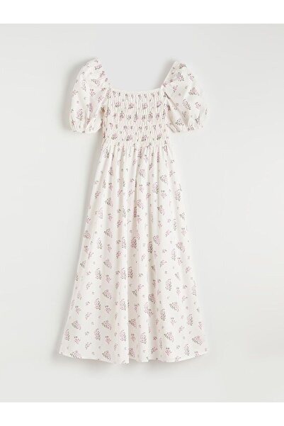 LC Waikiki فستان من قماش البوبلين بياقة قاربية وأكمام بالون مزينة بالزهور