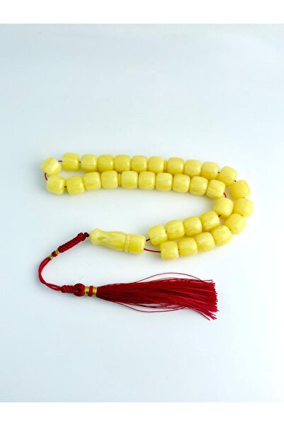 221331 An elegant rosary made of amber dust, with a handmade tassel.