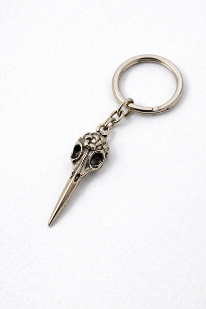 HER ŞEY NOTA www.herseynota.com حلقة مفاتيح معدنية بلون فضي عتيق مع شكل طائر ...