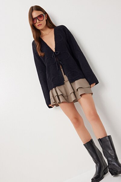 Hiccup ISTANBUL Soft, textured cardigan with a V-neck, long sleeves and draws...