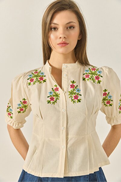 Hiccup Bianco Lucci linen shirt with floral embroidery and elasticated sleeve...