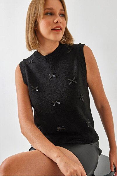 Hiccup Bianco Lucci bow sweater vest