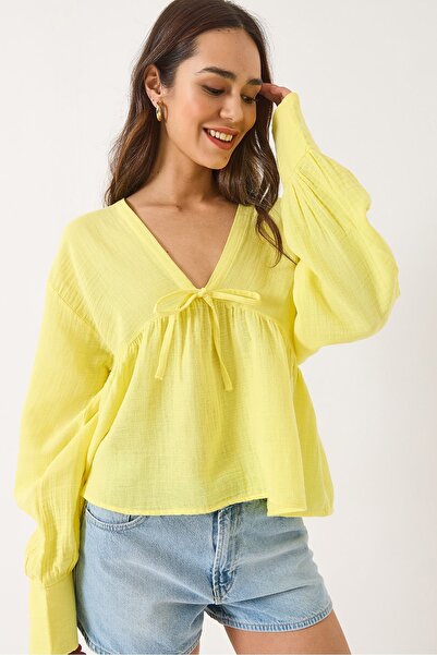 Hiccup Bianco Lucci muslin blouse with V-neck and knot details