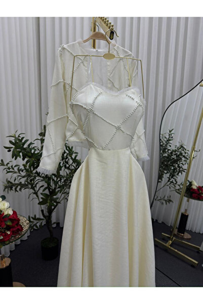 MANGONA Luxurious Indian linen evening gown embellished with a pearl net