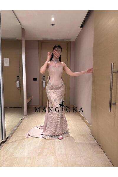 MANGONA Champagne "corset" evening gown with a skirt adorned with cascading b...