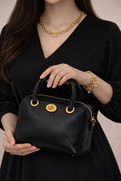 BARAQA Black grained leather bag with gold clasp
