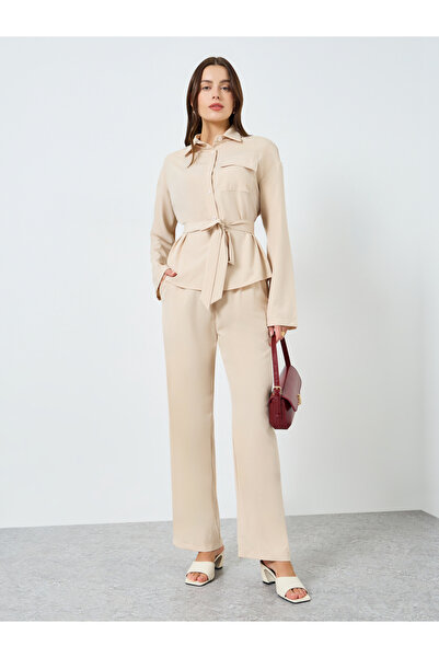 Styli Women Beige Belted Top and Wide Leg Trousers Co-Ords
