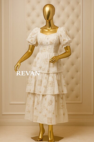revan A dress with elegant prints and a distinctive feminine design