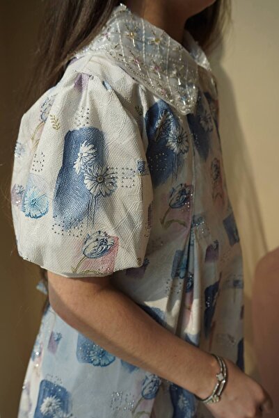 Banuta Soft sky blue dress with a belt tie at the back