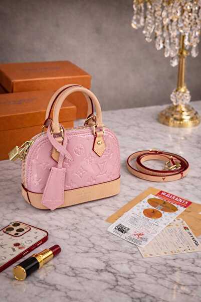 BARAQA Mini patent leather handbag in pink with a raised pattern