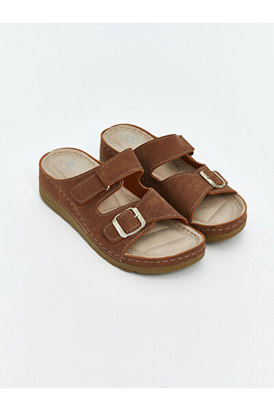 LC Waikiki شباشب نسائية من أوزماركا للموسم الجديد بمظهر جلد الغزال