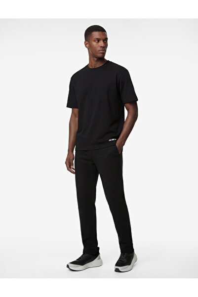 Koton Άνετη εφαρμογή με λεπτομέρεια στάμπας, επένδυση fleece Αθλητικό παντελό...