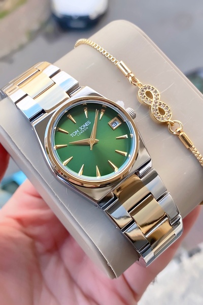 Tom Jones kadın kol saati orjinal 3atm su gecirmez çelik 2 yıl garantili bile...