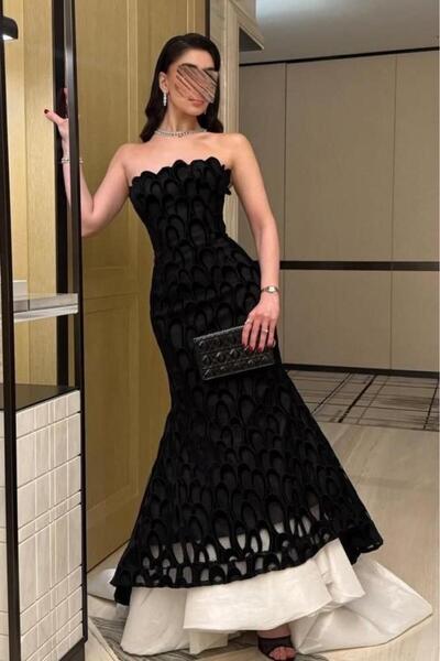 Genenic black evening dress with a train