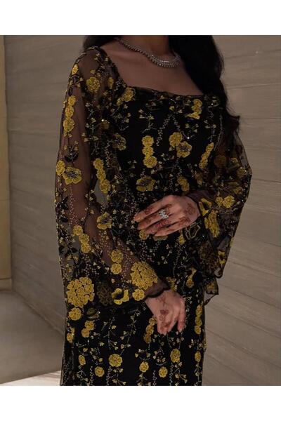 Genenic فستان اسود شفاف بكلفه ورود اصفر رائع