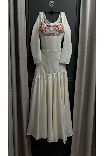 lamsuh harir Tala's dress