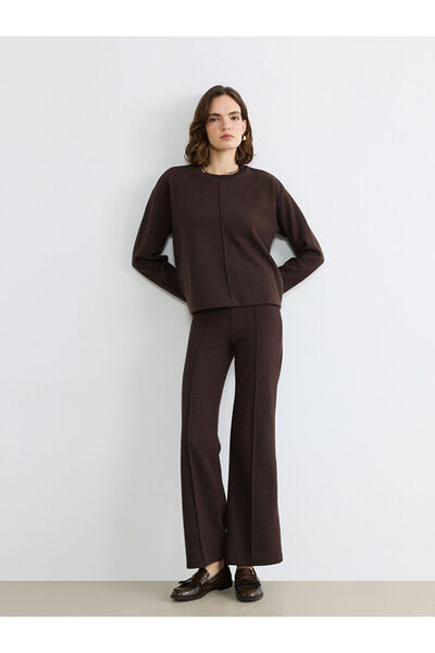 LC Waikiki Γυναικεία πλεκτά παντελόνια με φαρδιά μπατζάκια και κορδόνι στη μέ...