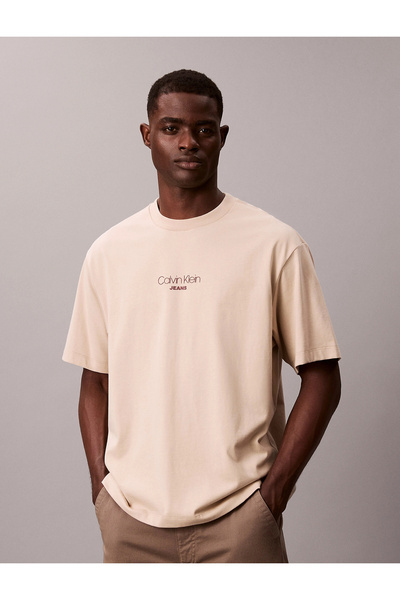 Calvin Klein تي شيرت رجالي من SS 16S RLXD FIT CKJ GRAPHIC TEE باللون الكريمي