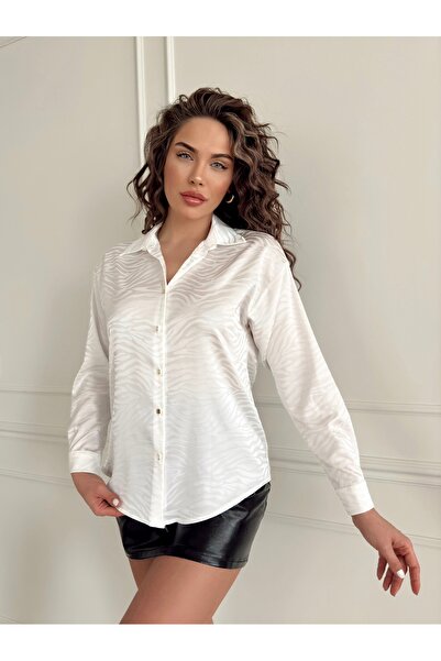 Step Elegant long-sleeved shirt with a zebra print and metallic buttons - Mad...