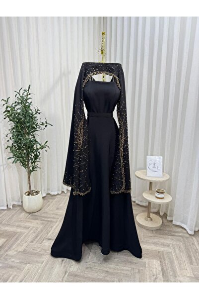 ainaqat aljawhara Najla's dress