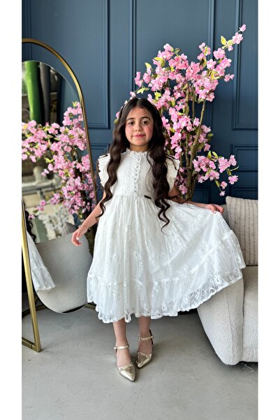Warazan Soft children's dress with an off-the-shoulder cut