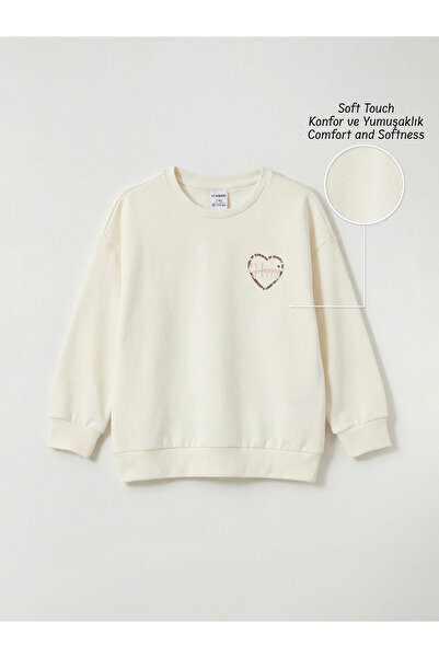 LC Waikiki ARTI-STORE سويت شيرت بناتي برقبة دائرية وأكمام طويلة، ويوجد تفاصيل...