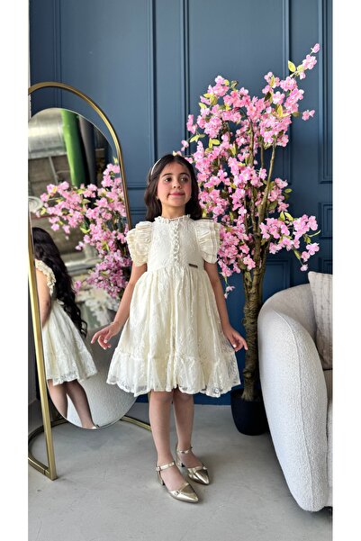 Warazan Soft dress with an off-the-shoulder cut