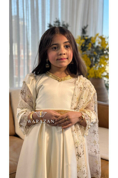 Warazan Ramadan dress in a gold color with a gold collar
