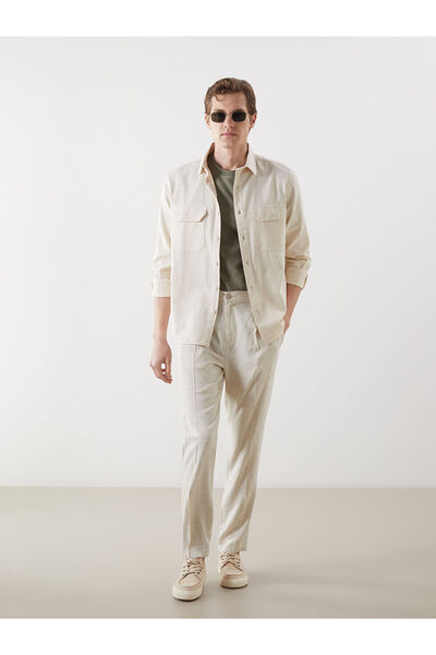 LC Waikiki بنطلون تشينو رجالي مطوي من مزيج الكتان بتصميم قياسي للموسم الجديد ...