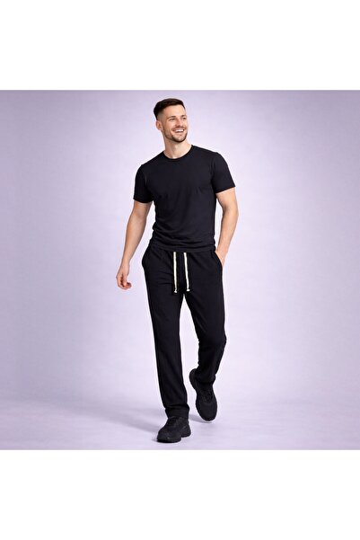 Asimetrix Store Straight pants with a loose fit and a stripe on the front center