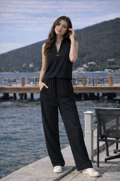 mor butik طقم سترة وبنطلون نسائي من الكتان الأسود مع تفاصيل إكسسوارات، تصميم ...