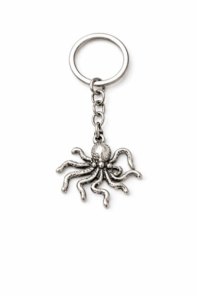 HER ŞEY NOTA www.herseynota.com Breloc metalic subțire cu figurină marină cu ...