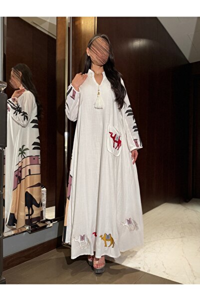 salsa-dresses Jalabiya with artistic designs in two colors