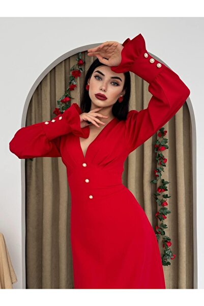 ETİKAFASHION Soft red dress with long sleeves, elegantly adorned with buttons...