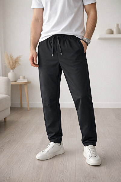 Exclusive Season Men's sports sweatpants, elastic waist, stretchy material, l...