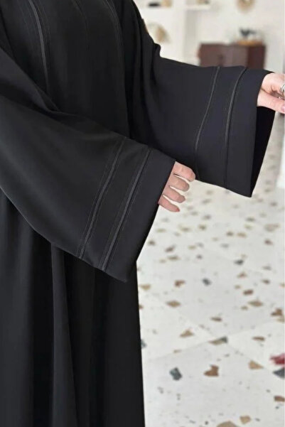 Abay-ti Elegant plain abaya with a sophisticated design, made of high-quality...