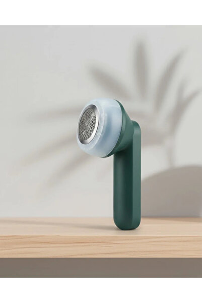 Epilons Fuzz removal device for sweaters, blankets and curtains