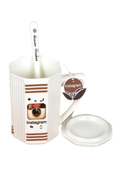 Null كوب شاي مع ملصق إنستغرام