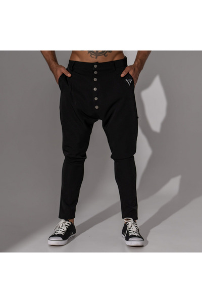 Asimetrix Store Men's black casual pants with a loose fit and metal buttons o...