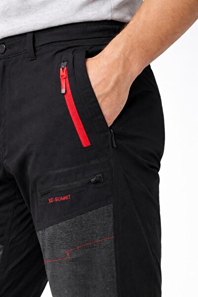 Wolff بنطلون ليكرا مرن ورقيق ومريح من القماش للاستخدام الخارجي مع تفاصيل عند ...