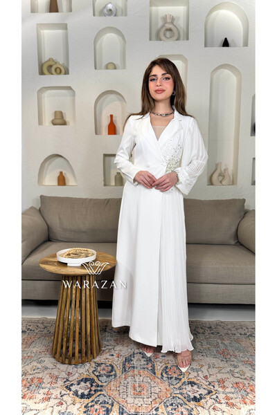 Warazan A dress with half pleats and ruffles